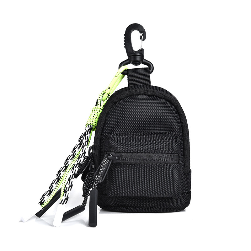 Mini bolso de montaje ligero, bolso de cambio portátil multifuncional, marca de moda con bolso de auriculares de montaje de bolso pequeño.