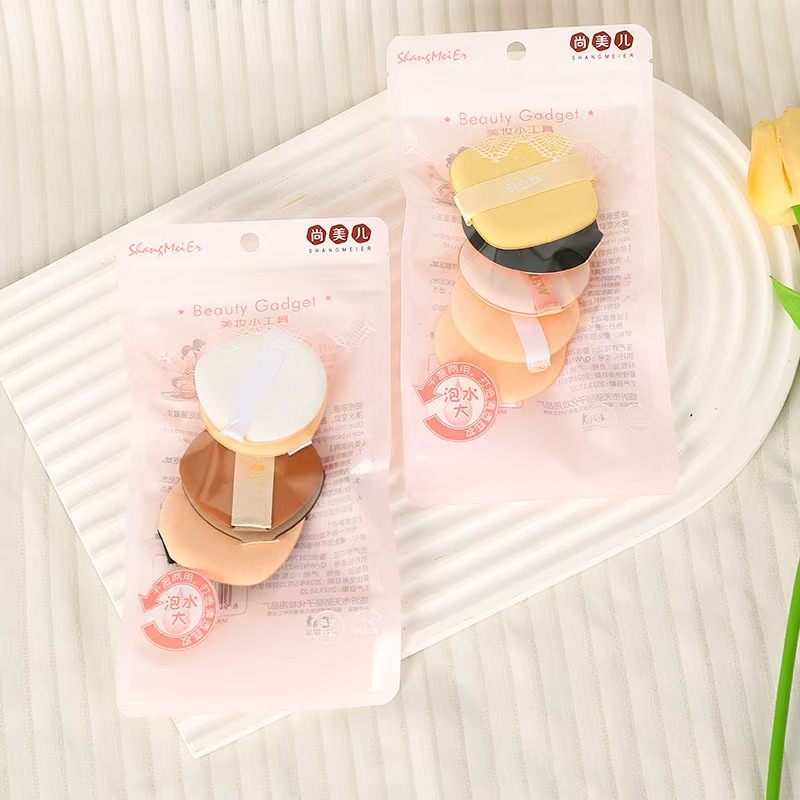 El nuevo polvo Shangmei 'er gota de agua polvo de algodón para el maquillaje ligero, ropa de vestir seco y húmedo, polvo de doble uso, cojín de aire