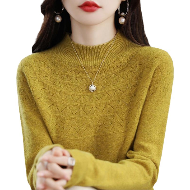100ウールのセーターの女性の半高襟はやせているセーターのシームレスなカシミヤのニットの底のシャツの秋冬の透かし彫りのゆったりした上着を現します。