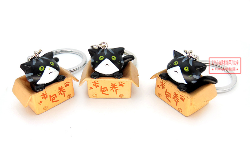 Gato de dibujos animados llavero colgante lindo gato muñeca estudiante adornos campus tienda suministro al por mayor