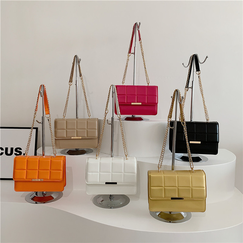 Bolsa de casca dura de cuadrilátero de cadena sólida, bolso cuadrado de damas de este año, bolso de hombro de moda de textura, bolso de mochila casual