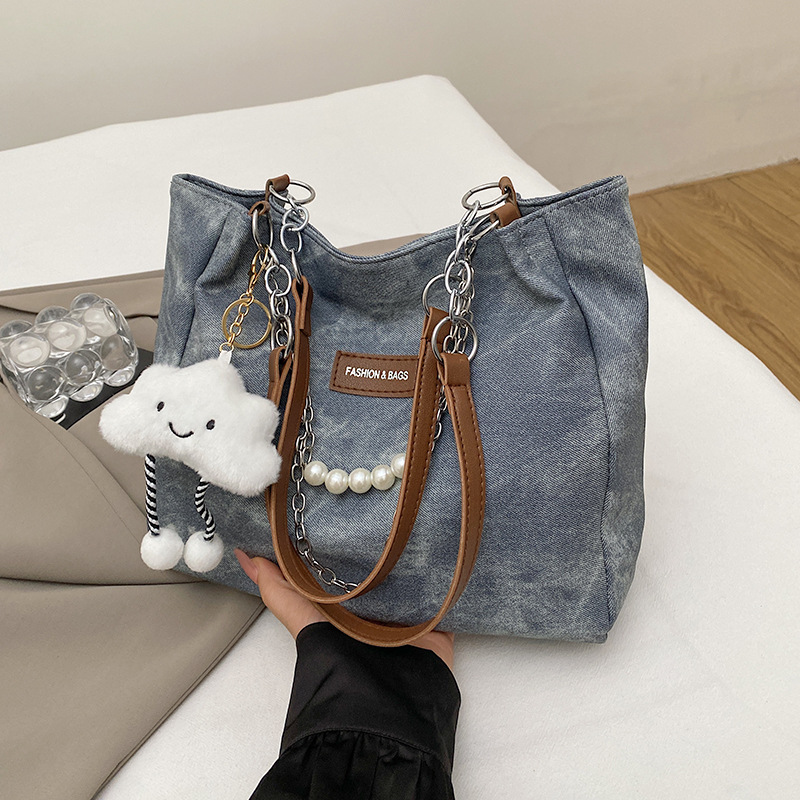 Capacidad de gran cadena de TOT 2024 nueva bolsa de moda de viaje de hombro de invierno para estudiantes universitarios superiores bolsa de clase