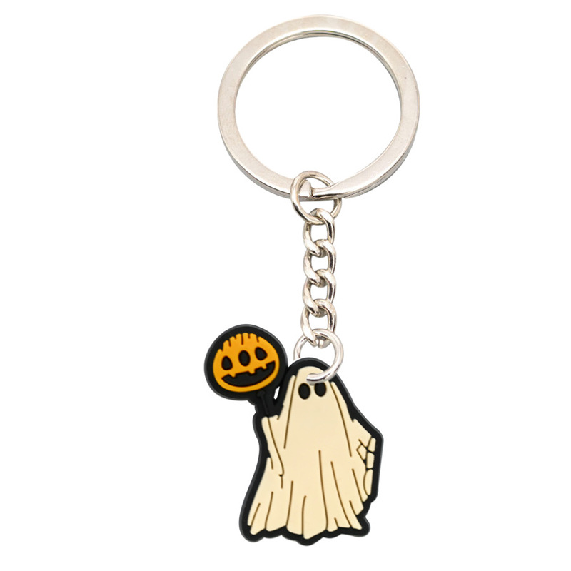 アマゾンのハロウィーンの漫画のキーホルダーの装飾品はカボチャの漫画のPVCの柔らかいゴムのキーチェーンの装飾品を掛けます。|undefined