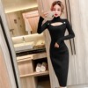 Hollowed out low chest mid length A-line long skirt knitted dress long sleeve dress