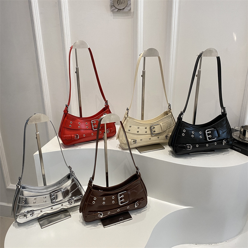 Transfronterizo 2025 primavera y verano nuevo estilo de alta calidad diseño de nicho bolso de viaje diario de un solo hombro bolso de axila con decoración de cinturón