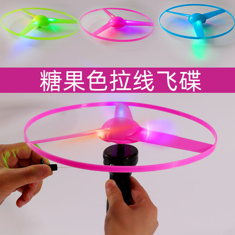 Frisbee volador luminoso con cuerda para niños, juguete flash con diseño UFO