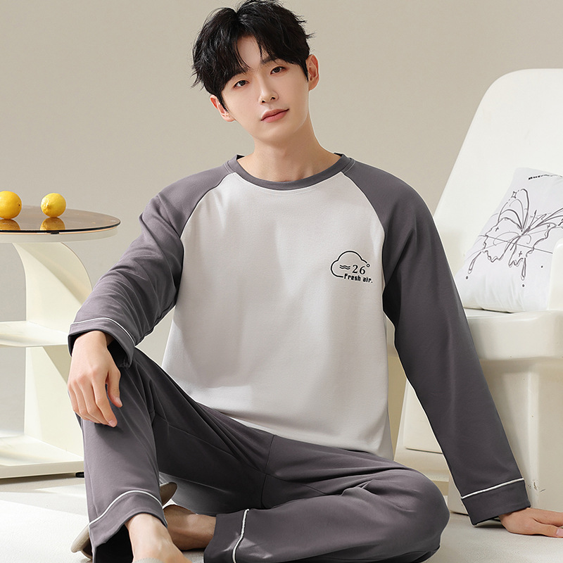 Autumn men's long-sleeved pajama set, featuring a simple and casual design with a touch of sophistication, color-blocked for a stylish look, and made of comfortable cotton material, suitable for both indoor and outdoor wear