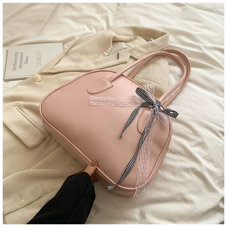Small design handheld one-shoulder bag with bow, South Korea
