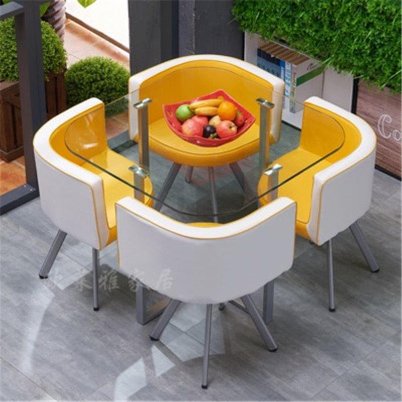 Mesa y sillas de comedor modernas, mesa redonda pequeña de vidrio templado, mesa y sillas para recepción y negociación, una mesa y cuatro sillas, cocina de inducción.