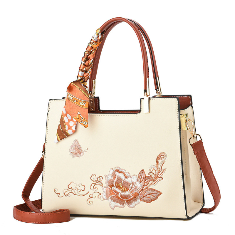 Buñuelo de seda decoración estilo nacional bordado bolso temperamento versátil bolso de mochila bolso de madre bolso de hombro casual bolsas transfronterizas