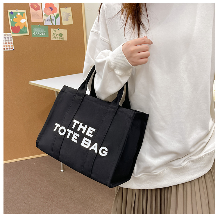 Bolso de lona Hebei Baiou para mujer, de color sólido con estampado de letras, bolso bandolera de un solo hombro con estampado de letras.