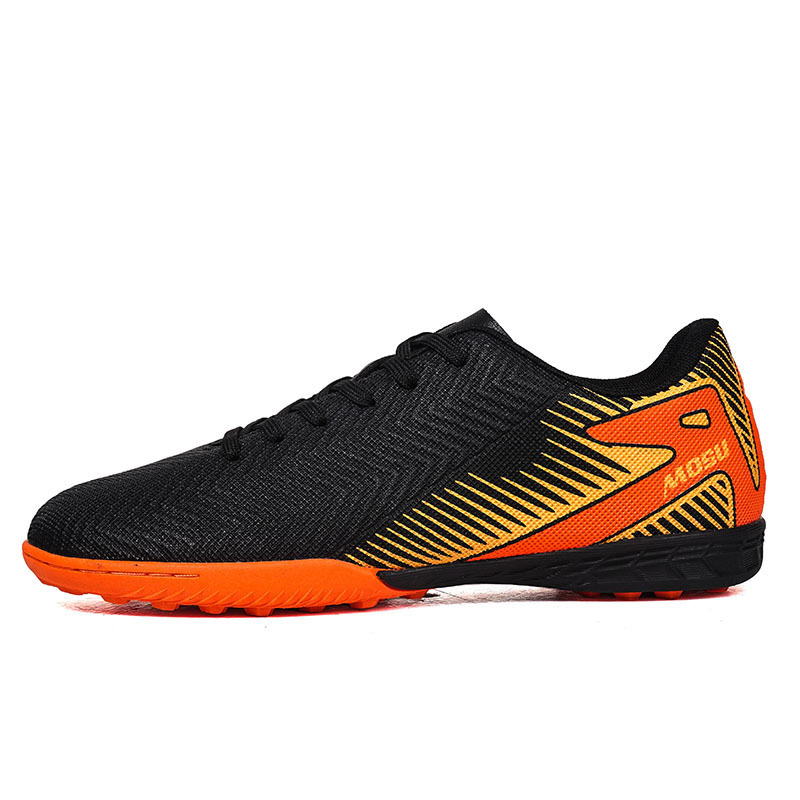 2025 nuevo transfronterizo hombre y mujer largo clavos de fútbol juvenil competición de zapatos de fútbol fábrica de ventas directas comercio exterior