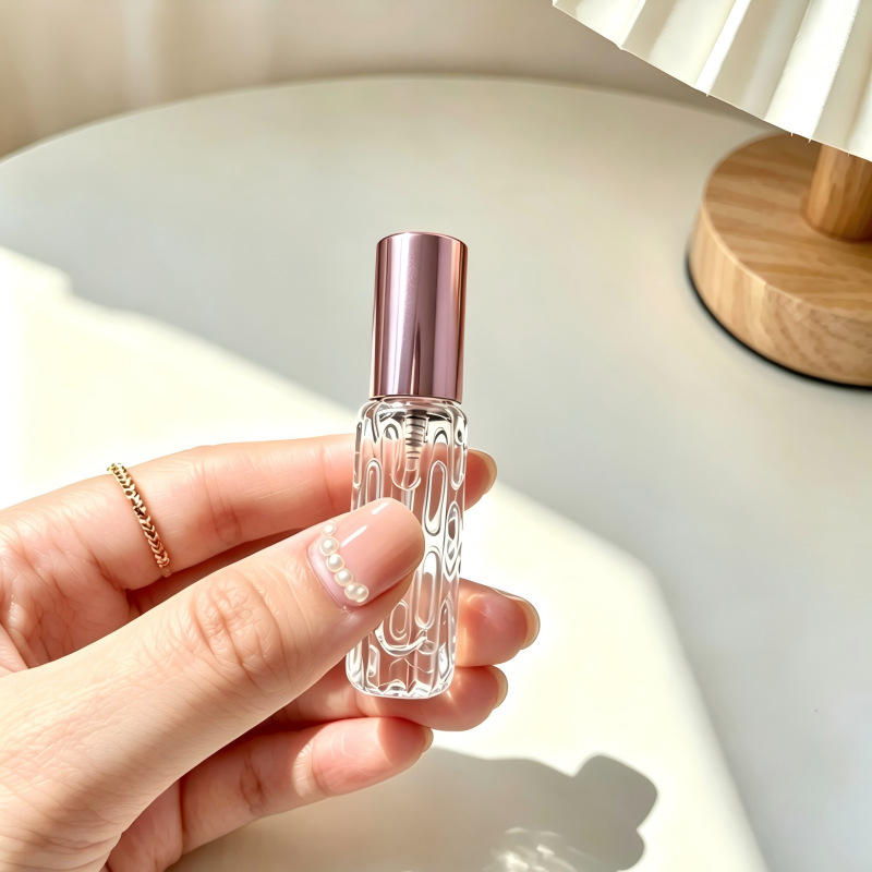 En stock al por mayor 10ml botella de spray de perfume de vidrio rosa de oro boquilla de aluminio perfume sub-botella prensa botella vacía