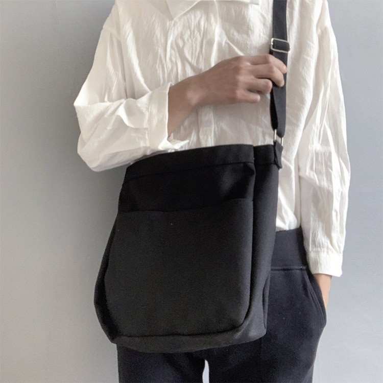 2024 nuevo estilo estilo estilo perezoso bolso de lona de mensajero de color sólido en blanco bolso escolar de estudiante bolso de hombro de estilo universitario ins