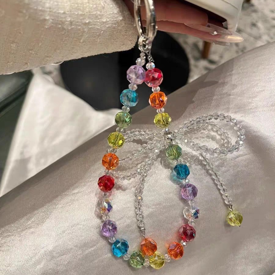 New High-End Ins Rainbow Crystal Mobile Phone Pendant Headphone Shell Anti-Lost Crossbody Chain Versatile Bow Hanging Chain