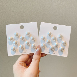 Pantalones de jeans de cintura, botones de cintura ajustados, botones ajustables fijos