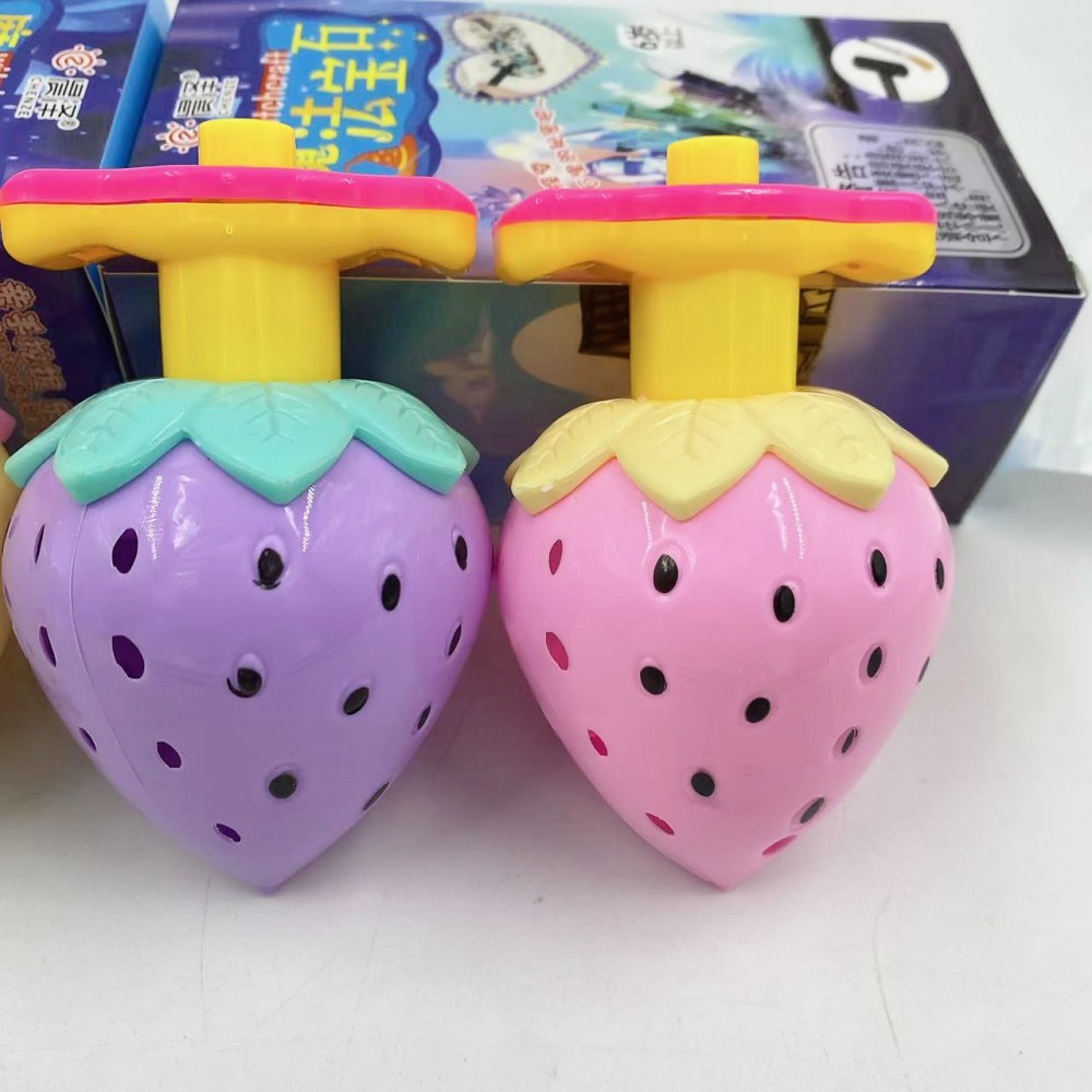 Dibujos animados de fresa luminosa Gyro lanzamiento juguete puesto juguete venta al por mayor mercado nocturno cantina suministro regalo rotación