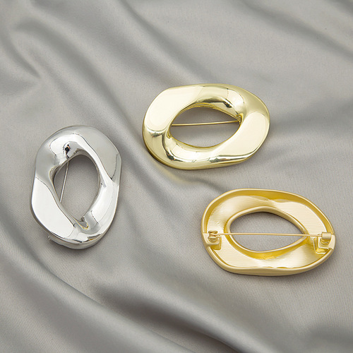 European and American fashionable glossy irregular geometric design round brooch creative personalized suit accessories