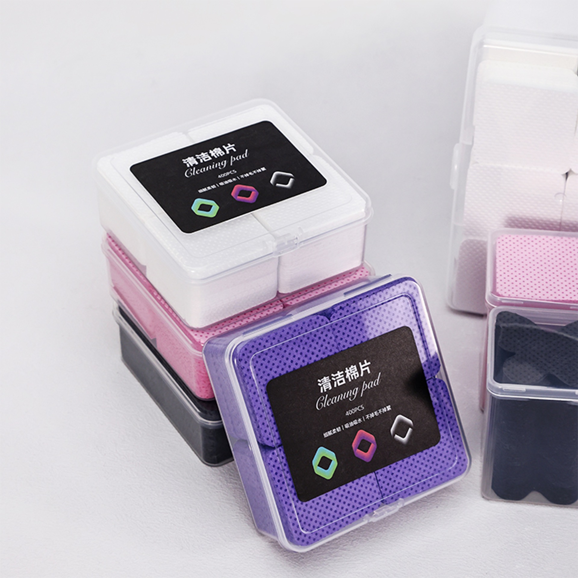 Las almohadillas de algodón para limpieza de manicura no son fáciles de perder el cabello. Toallita mágica para limpiar la boca de la botella de pegamento transfronterizo. Almohadillas de algodón para manicura de tres piezas.