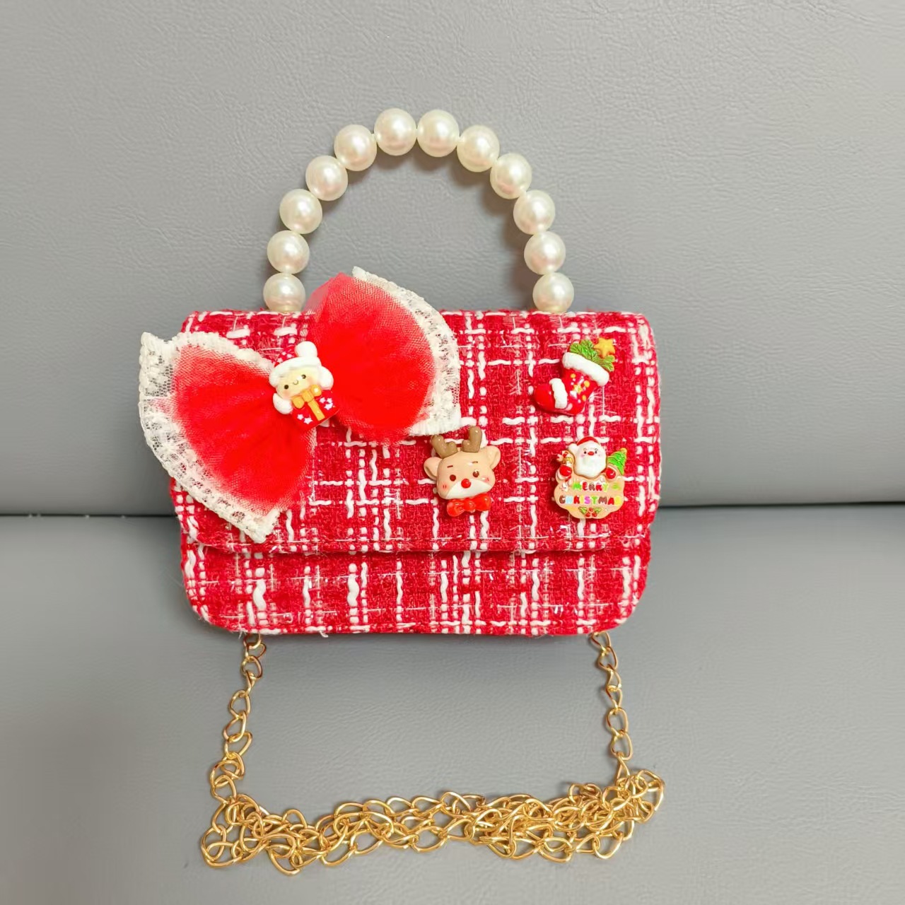 Cartera de Año Nuevo rojo arco de papá Noel bolso de perla pequeña cadena de viento fragante bolso de hombro