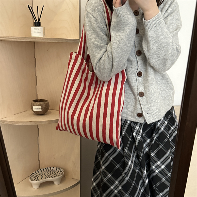 Bolsa de lona a rayas coreana simple bolso de hombro de estudiantes de literatura y arte gran capacidad de lazo bolso de mano