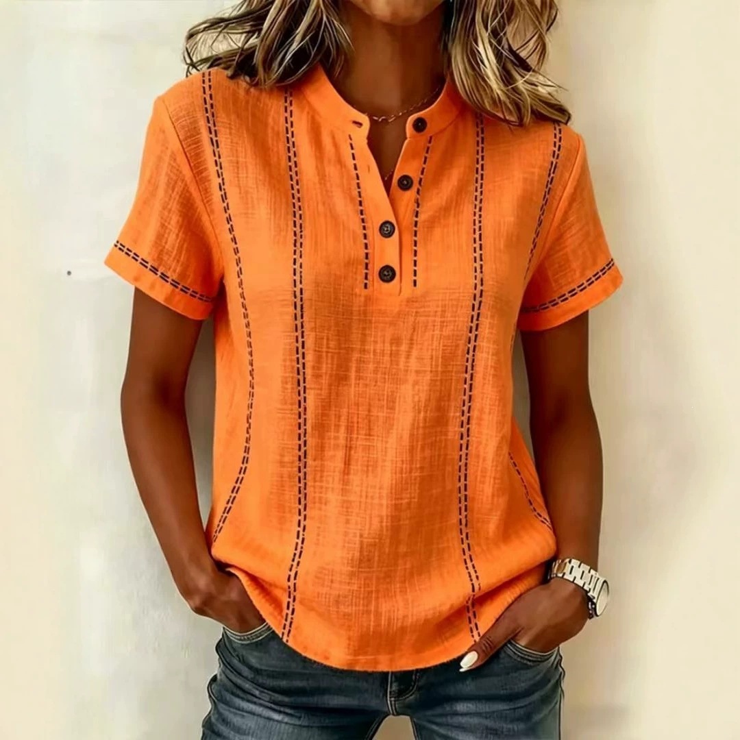 Transfronterizo 2026 estación independiente Amazon verano relajado casual explosión impresa botón de cuello de pie camisa de mujer de manga corta