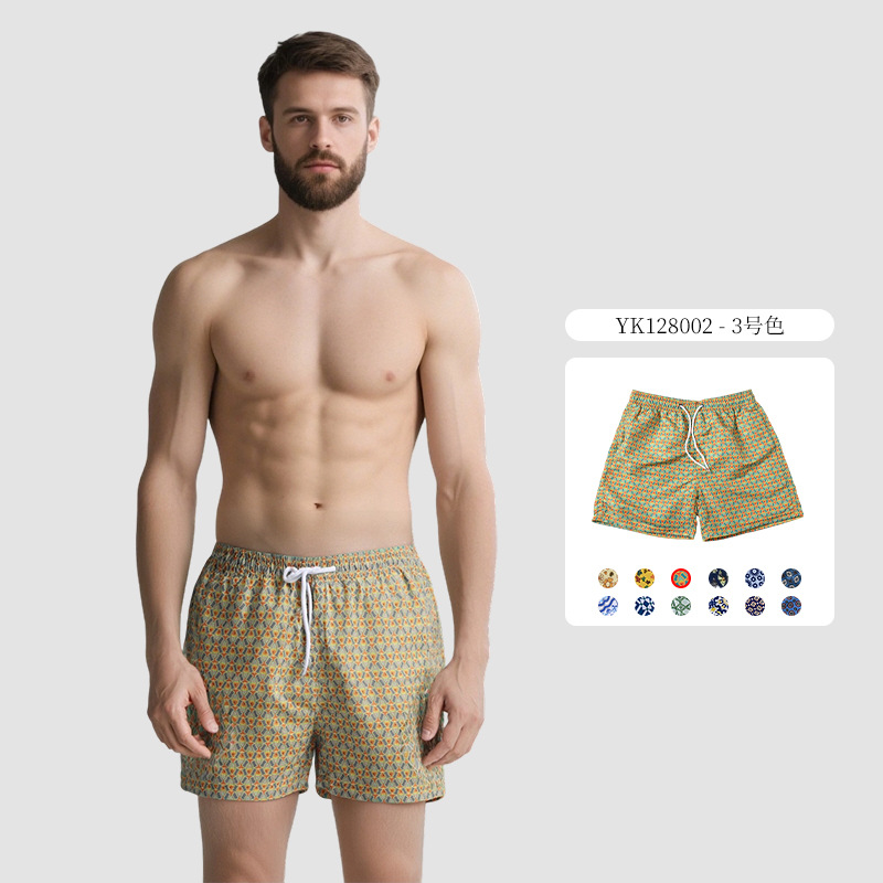 Pantalones de cuatro puntos florales de piel de melocotón para hombre, bañador casual de playa de tamaño europeo, forro de secado rápido, pantalones de playa de vacaciones junto al mar