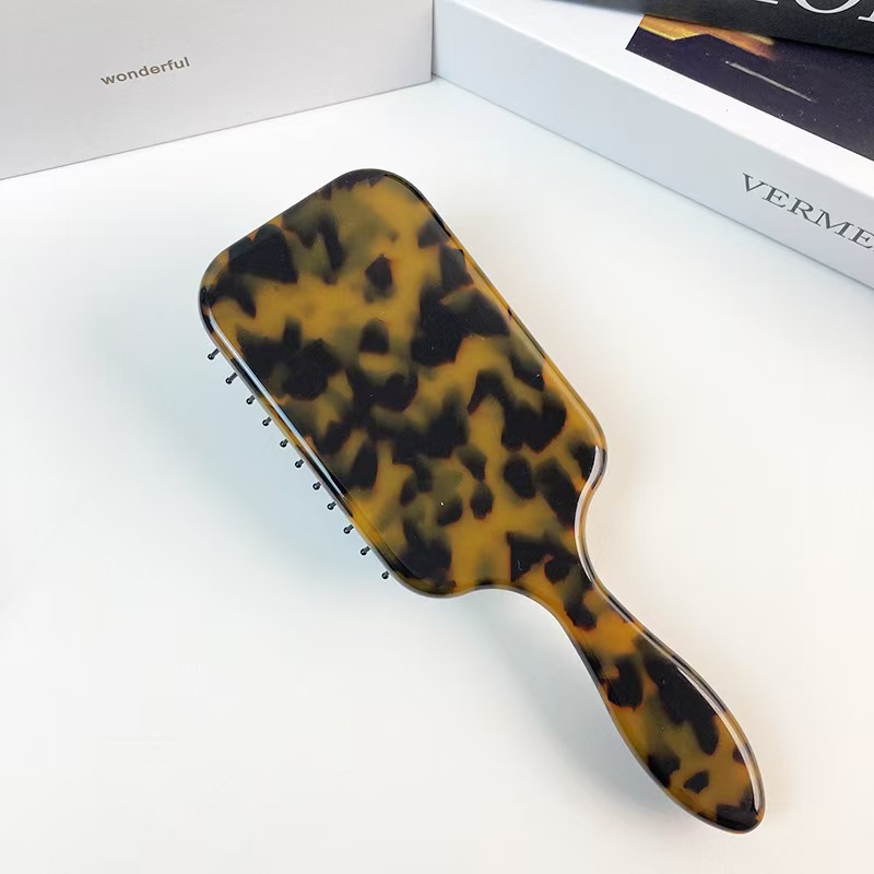 Peine de cojín de color de acetato de exportación transfronteriza, peine de bolsa de aire de forma esponjosa para el hogar para damas populares europeas y americanas