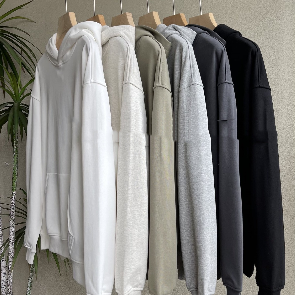 2024 pareja nueva chaqueta con capuzas manguera collar chaqueta deportiva con capuzas suéter