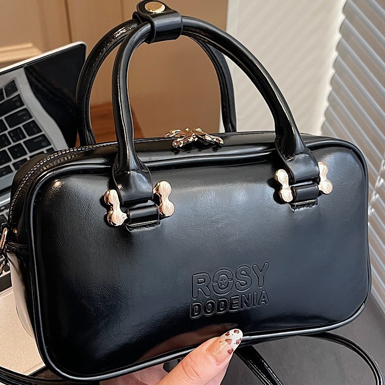 Bolsas de mano de moda populares para mujeres 2026 primavera nuevo estilo coreano sensación diaria bolsas de hombro para trabajar bolsas de viaje