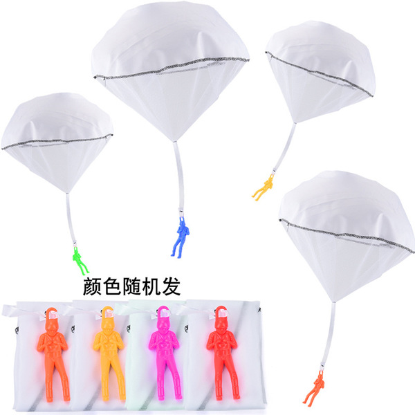 Spot children hand tossing parachutes