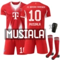 Size 10 musi with socks + protective gear