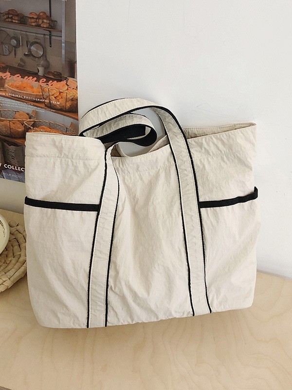 Bolsa de mano de tela de nylon de gran capacidad para mujeres 2026 nueva simple, ligera y versátil bolso de hombro de viaje diario
