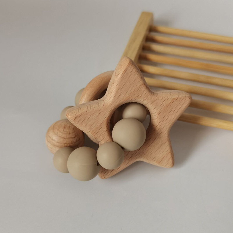Nuevo bebé suministros de dibujos animados estrella haya mordedor creativo bebé mordedura de silicona pulsera molar teether