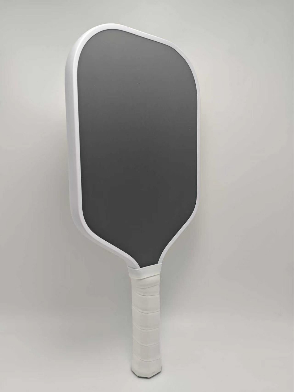 Carbon fiber pickleball rackets with heat-pressed integrated textured matte finish, manufacturer supports custom orders