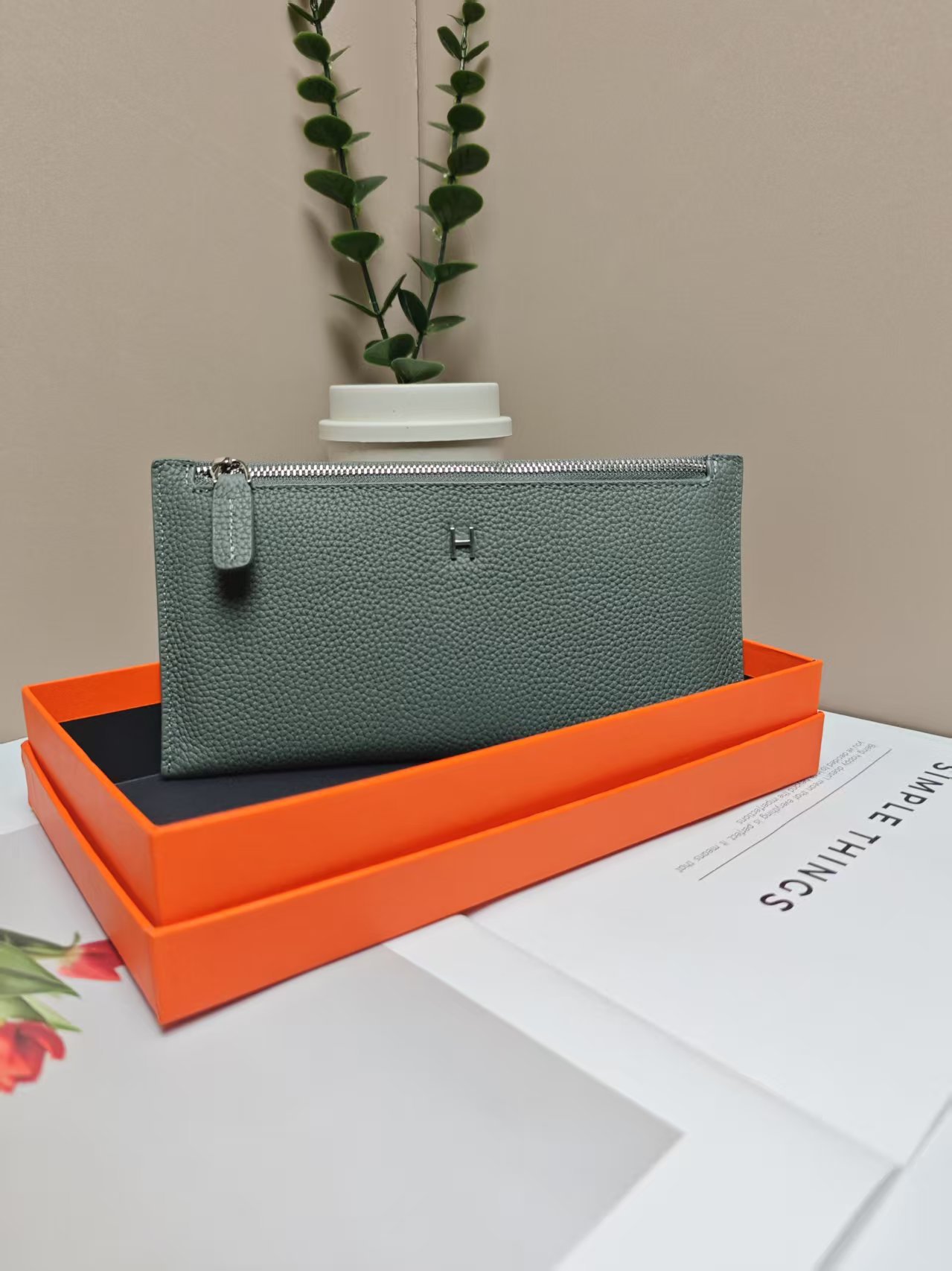 Almond green wallet, box, genuine leather