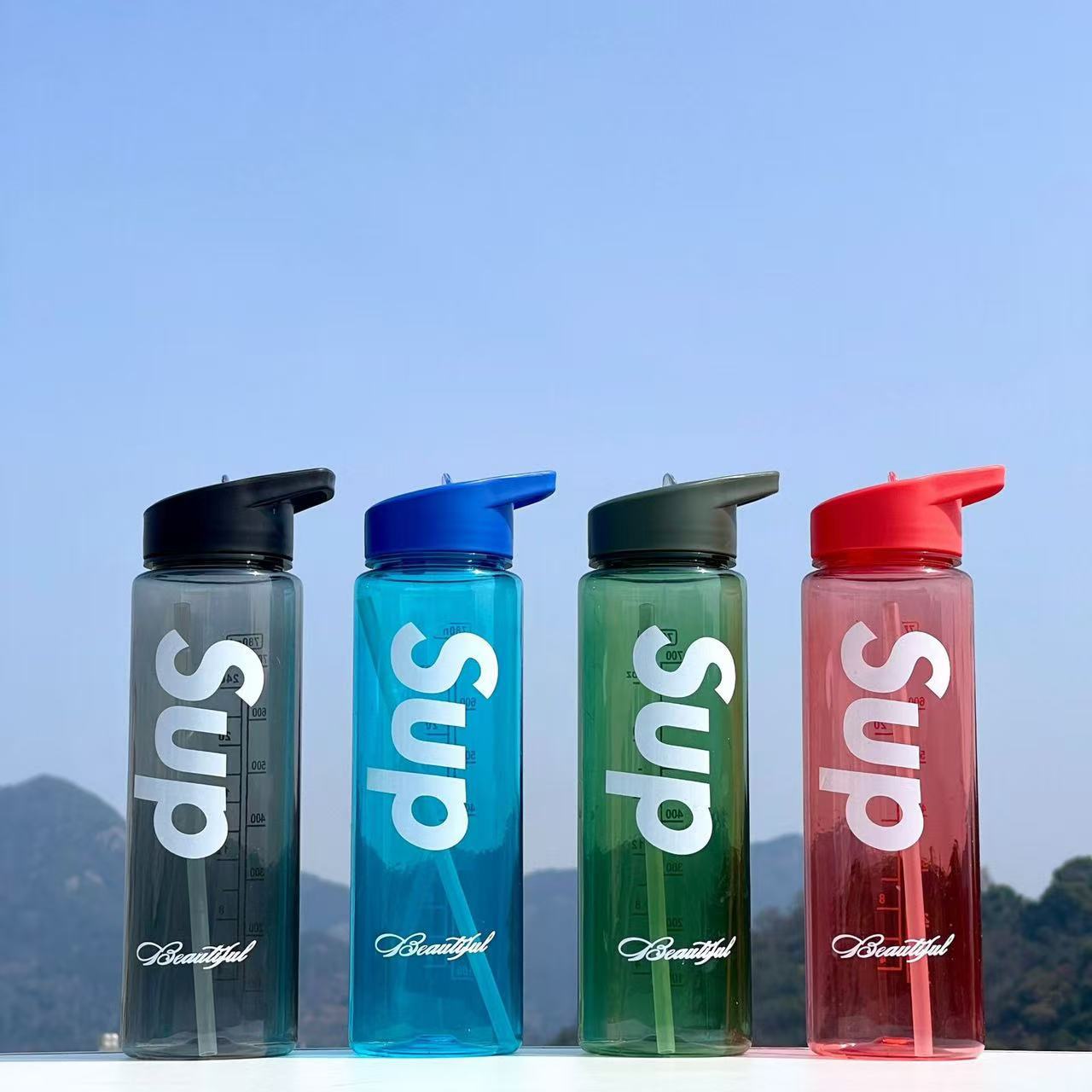 Transparente transfronteriza de alto valor de la cara cubierta de resbalaje taza de agua de paja de gran capacidad portátil encantador anti-caída taza espacial