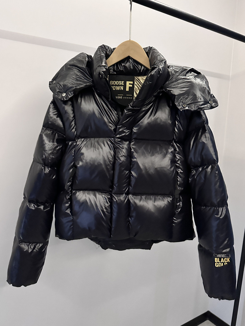 Chaqueta corta de plumón de oro negro para mujer 2025 nuevo estilo invierno plumón de ganso blanco manga extraíble diseño sensación suelta chaqueta gruesa