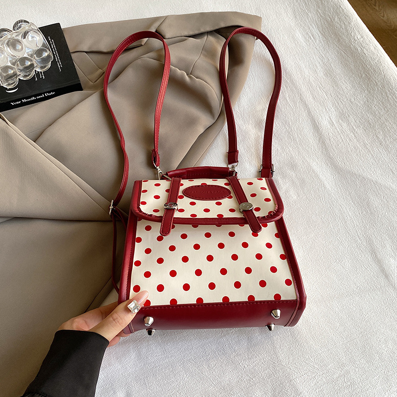 Mochila de estudiantes de ondas coreanas para mujeres 2024 nueva moda alta sensación de nicho de moda mochila de viaje