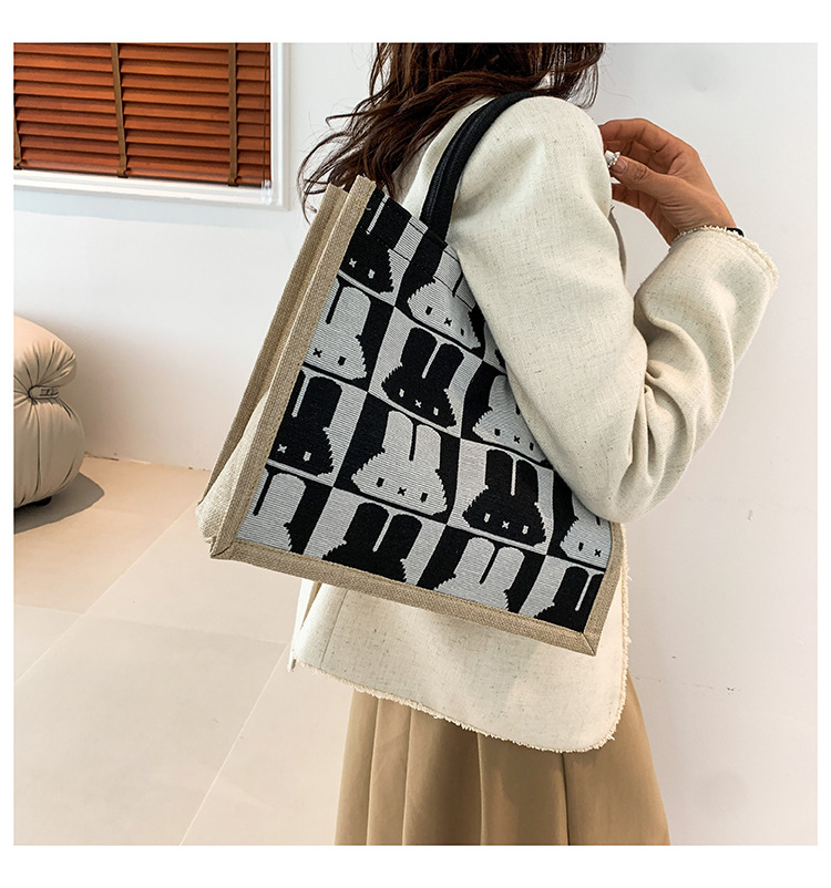High-end mid-capacity canvas school commuting handbag 2024 new style fashionable and versatile linen single-shoulder tote bag undefined