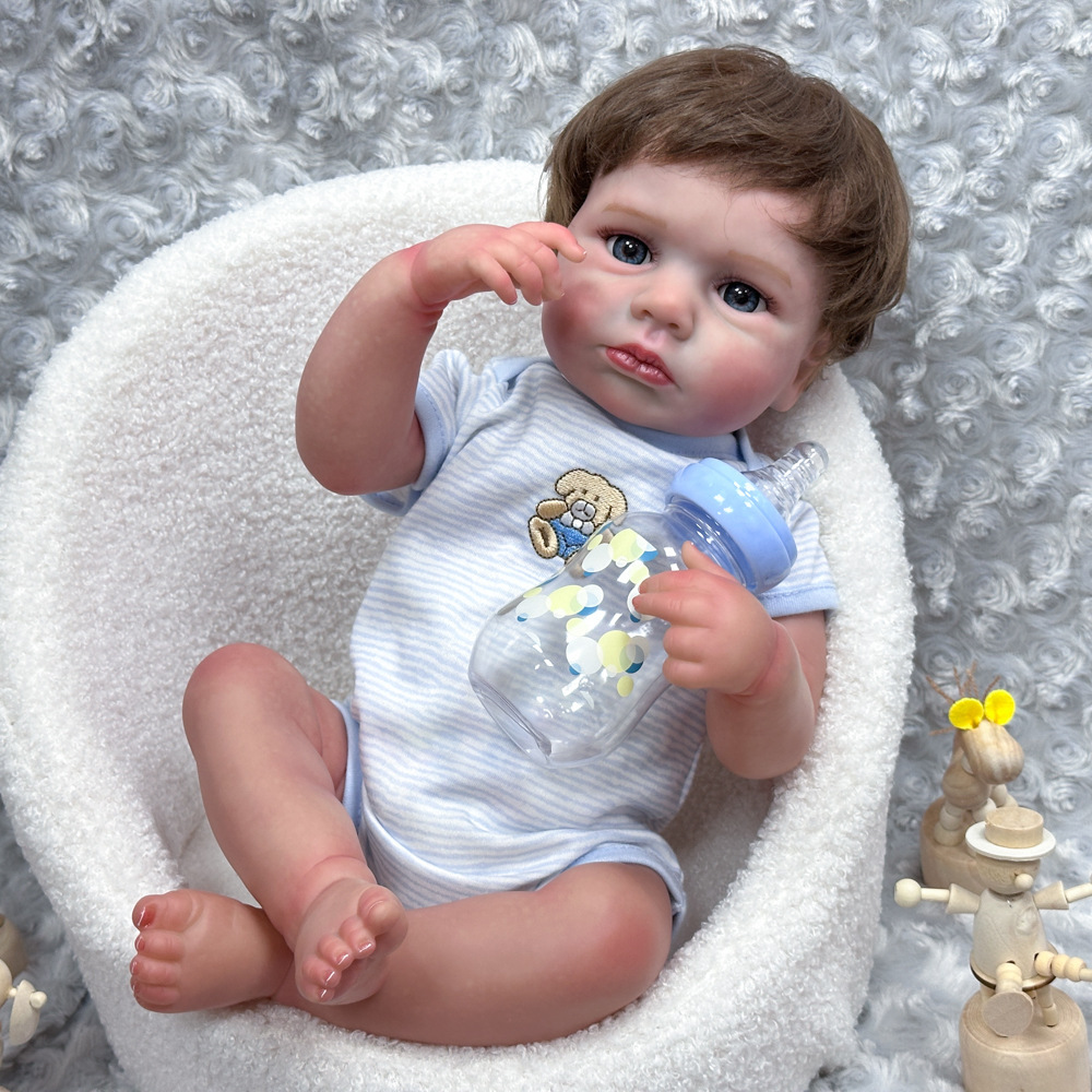 Una fuente de envío de muñecas para bebés pesados transfronterizos 20 pulgadas muñecas de simulación para recién nacidos LouLou