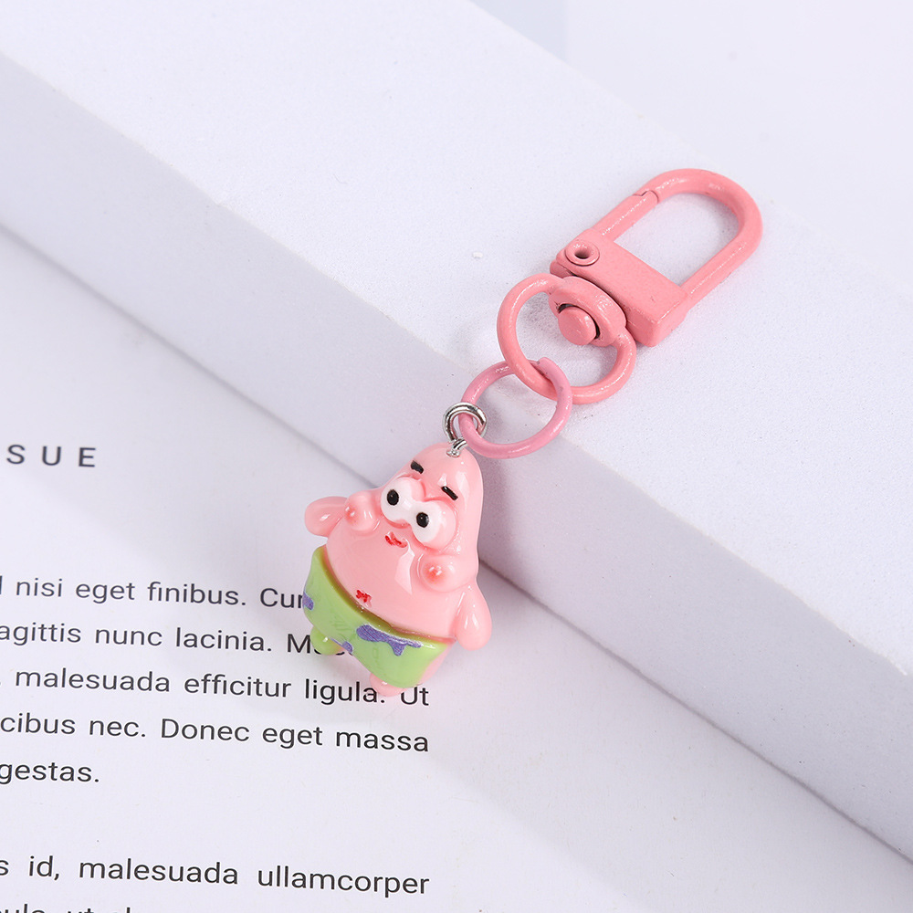 Caricatura encantadora SpongeBob pie estrella de resina llave auriculares colgantes bolsos accesorios amigos regalos