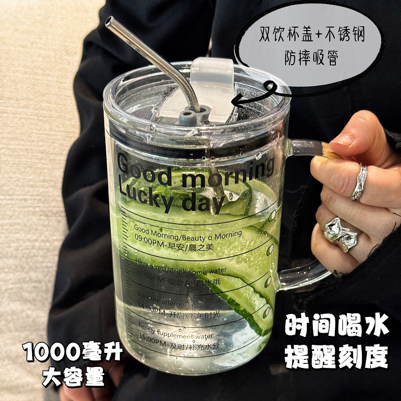 Vaso de vidrio de borosilicato de 1 L con pajilla