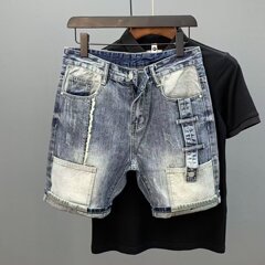 デニムのショートパンツの男性のファッションブランドの夏の新商品は簡単に壊れています。