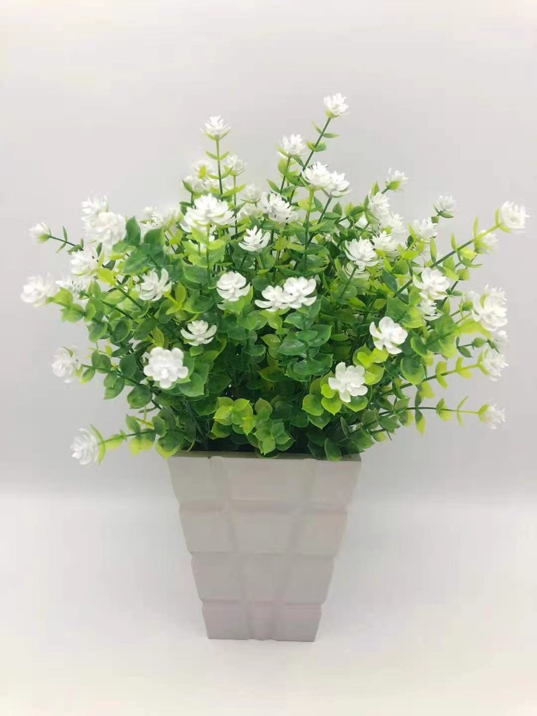 AliExpress Venta caliente artificial planta verde 7 cabezas 35 malla eucalipto Camelia flor artificial Flor de plástico flor decorativa