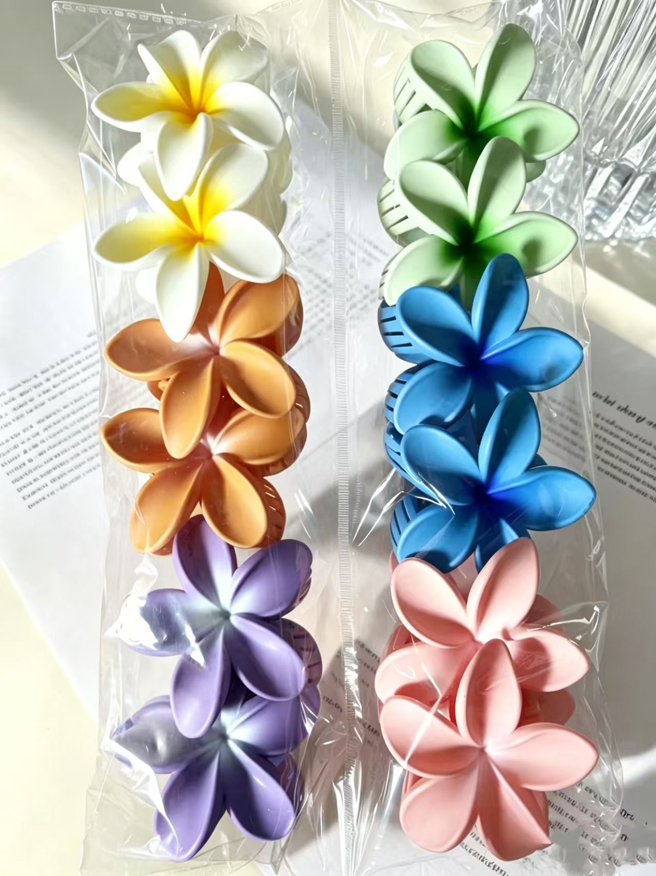 Vacancias de verano transfronterizas huevo flor clip para el cabello de mujeres tarjeta de sensibilidad avanzada 2026 nuevo conjunto de adornos para el cabello de flores laterales image 13