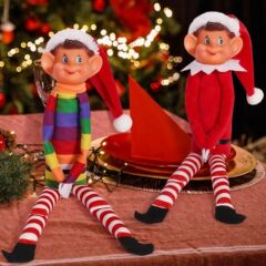 クロスボーダー新商品クリスマスの長い鼻の長い足の精霊の人形のぬいぐるみの座り方の本棚は人形の装飾品を並べます。