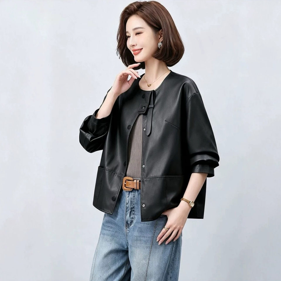Áo khoác da nữ dáng ngắn ôm vừa, cổ lập, tay dài, phong cách thanh lịch — Cam Hermès, đen