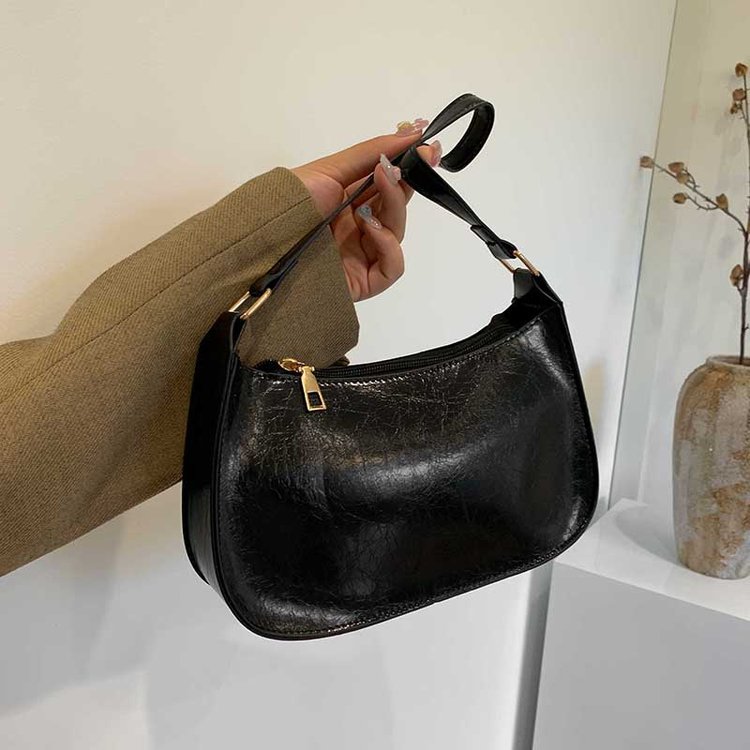 Niche Zhong retro bolso de braza, bolso de alta calidad, nuevo estilo de bolso de viaje, bolso de hombro de moda de gran capacidad.