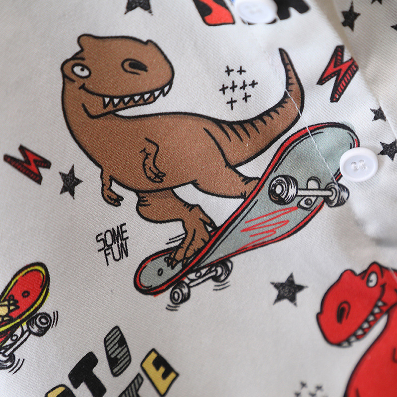 7751 Camisa de primavera para niños Camisa de manga larga con estampado de dinosaurio de dibujos animados para niños Primavera y otoño Tops atractivos de moda Primavera